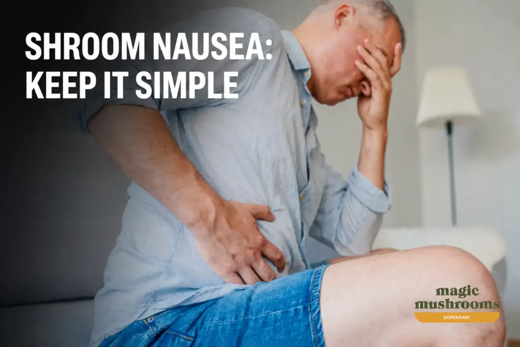 Person experiencing nausea and stomach discomfort after taking shrooms